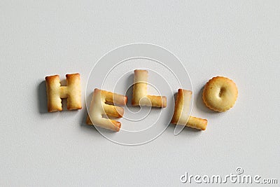 Inscription from the cookies on the white background. Text â€“ Hello. Stock Photo